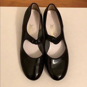 Size six black heeled Tap shoes.